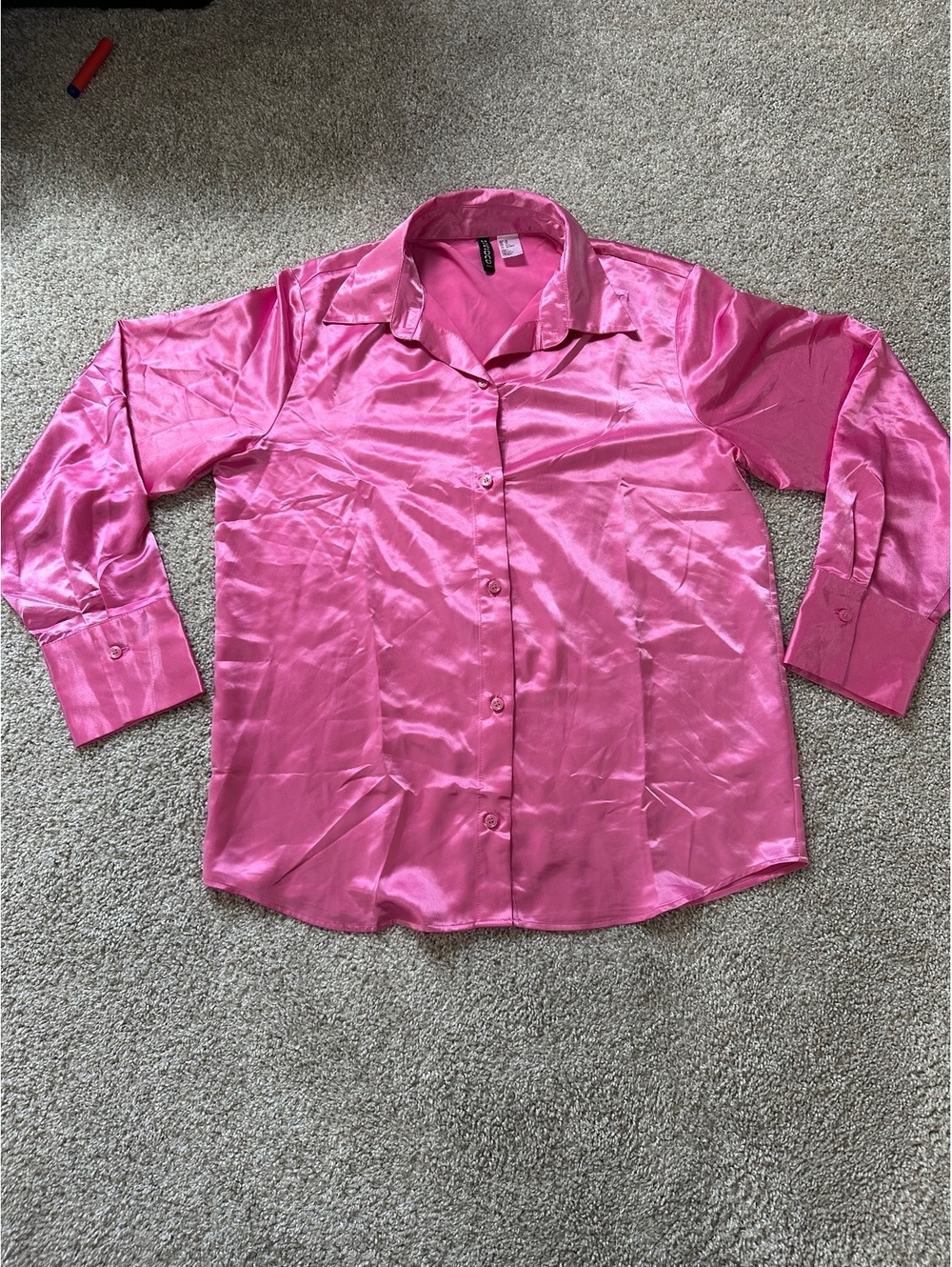 Divided shiny pink button up blouse